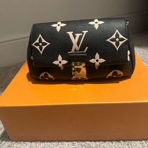Louis Vuitton Favorite Bag: Currently listed on the website at $3350 (plus tax)